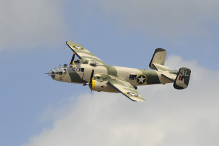 Small plane cloudy sky propeller 2 - side and a propeller free wallpaper
