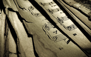 Musical notes paper closeup pen - a close up of a piece free wallpaper