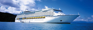 Cruise ship docked mountain range - the water near a mountain range free wallpaper