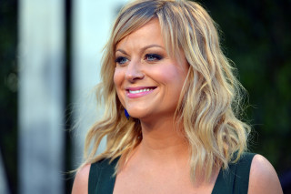Blonde woman green dress smiling - figurativism free wallpaper