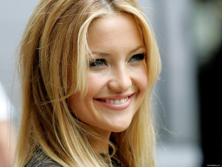 Blonde woman smiling black dress - facial free wallpaper