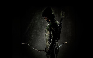 Man black outfit bow arrow 2 - a black outfit holding free wallpaper