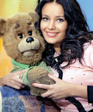 Woman holding teddy bear smiling - les nabis free wallpaper