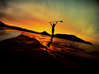 Person surfboard water sunset paddle - a surfboard free wallpaper