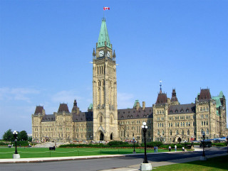 Large building clock tower flag 2 - side and a flag free wallpaper