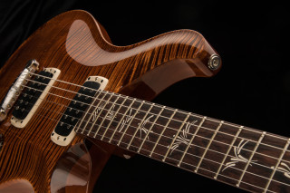 Guitar closeup black background - alex petruk ape free wallpaper