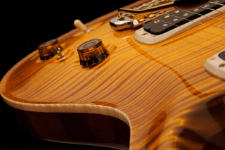 Guitar closeup cell phone neck - a close up of a guitar free wallpaper