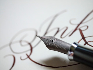 Fountain pen red ink writing - a piece of paper free wallpaper