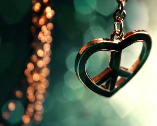 Peace sign necklace chain blurry - a necklace free wallpaper
