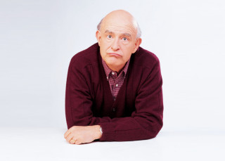 Man sitting floor arms crossed - verdadism free wallpaper