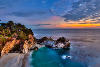 Sunset beach cliff ocean colorful - a colorful sky above free wallpaper