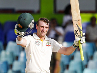 Man holding cricket bat helmet 4 - heroic free wallpaper