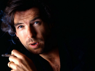 Man smoking cigarette dark hand - his mouth and a cigarette free wallpaper