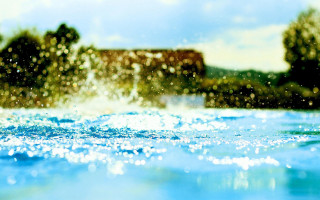 Blurry water trees building blue - summer free wallpaper for desktop