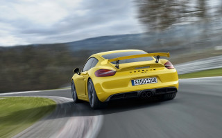 Yellow sports car driving road 2 - the rear end of the car free wallpaper