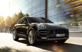 Black porsche cayenne city street - a city street free wallpaper