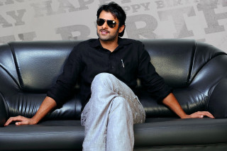 Man sitting couch legs crossed 4 - his leg free wallpaper