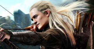 Woman long hair bow arrow - weta digital free wallpaper