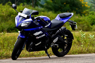 Blue motorcycle parked road grass - a blue motorcycle free wallpaper
