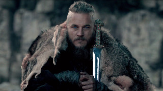Man sword fur coat shoulders 2 - a rock wall free wallpaper