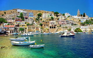 Boats lake hillside buildings trees 3 - a group of boats free wallpaper