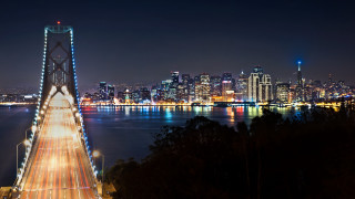 Night city bridge water lights - a city in the background free wallpaper