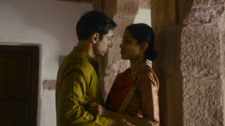 Man woman stone walls doorway - movie still free wallpaper