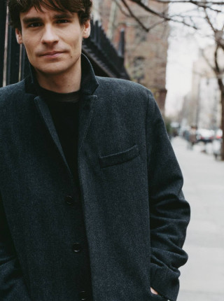 Man coat jeans hands pockets - private press free wallpaper