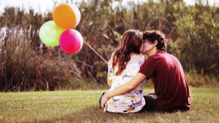 Couple kissing balloons field grass 3 - balloon free wallpaper