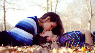 Woman child lying ground leaves - a woman and a child free wallpaper