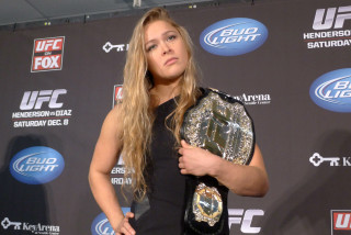 Woman holding wrestling belt logo - brenda chamberlain free wallpaper