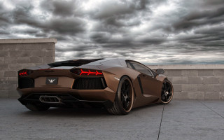 Brown sports car brick wall 2 - under free wallpaper for desktop