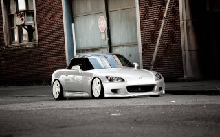 White sports car building street - a street corner free wallpaper