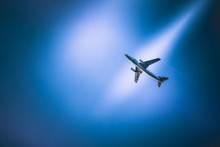 Plane flying sky tail fighter - a blue background free wallpaper