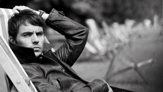 Man sitting chair head hands - dave kendall free wallpaper