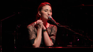Woman standing piano microphone performance - her hand and a microphone free wallpaper