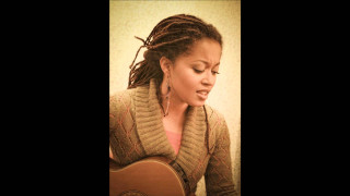 Woman dreadlocks playing guitar room - a guitar in a room free wallpaper