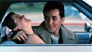 Man woman car smiling laughing - free valentines wallpaper