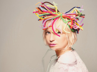 Woman colorful hairband white shirt - promotional image free wallpaper for desktop