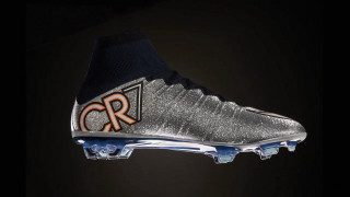 Soccer shoe closeup black background - christian hilfgott brand free wallpaper