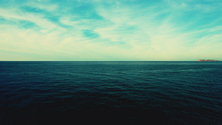 Ocean island sky beach water - a small island in the distance free wallpaper