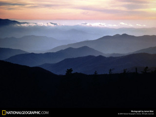 Mountain range clouds sunset pink 3 - a view of a mountain range free wallpaper