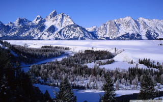 Snowy mountain river forest night - a snowy landscape free wallpaper