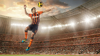 Man jumping stadium catching soccer - a stadium full free wallpaper