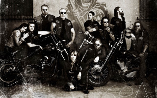Bikers group pose skeleton wall - a skeleton free wallpaper