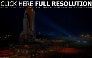Large rocket museum night background - display in a museum free wallpaper
