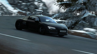 Black car driving forest snowy - snow and ice free wallpaper