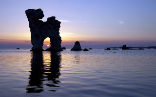 Rock formation water sunset background - a matte painting free wallpaper