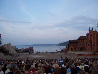 Crowd performance lake building foreground - stage free wallpaper