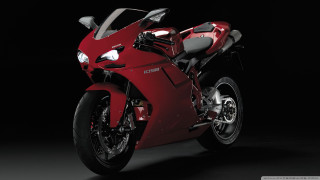 Red motorcycle dark room black 4 - a red motorcycle free wallpaper